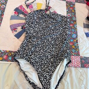Lot of 9 swimsuits 
fit a size 6 
most are 6 or medium